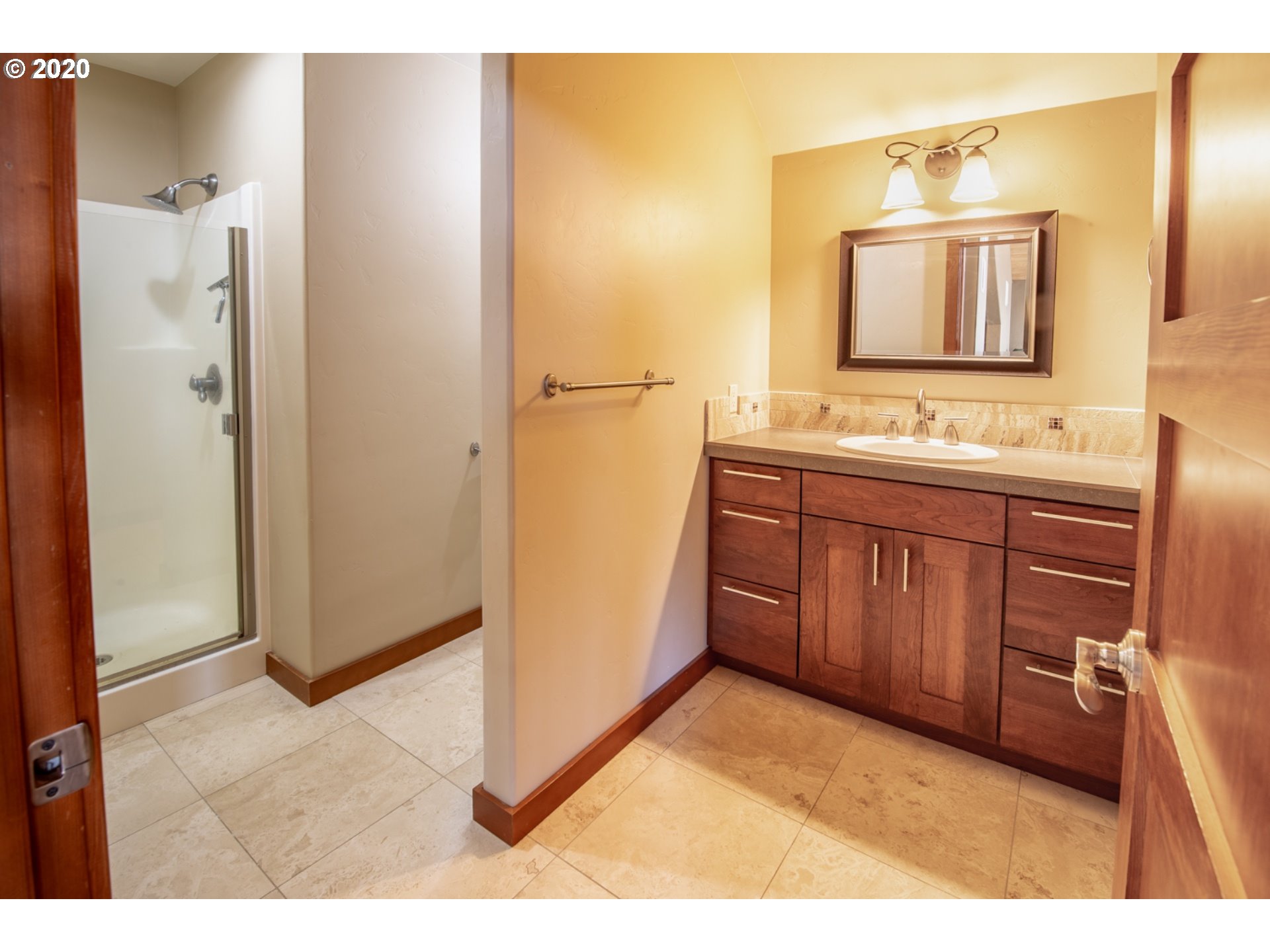71 Tunnel Road White Salmon, WA 98672 - Photo 26 of 28 a bathroom with a sink and a mirror