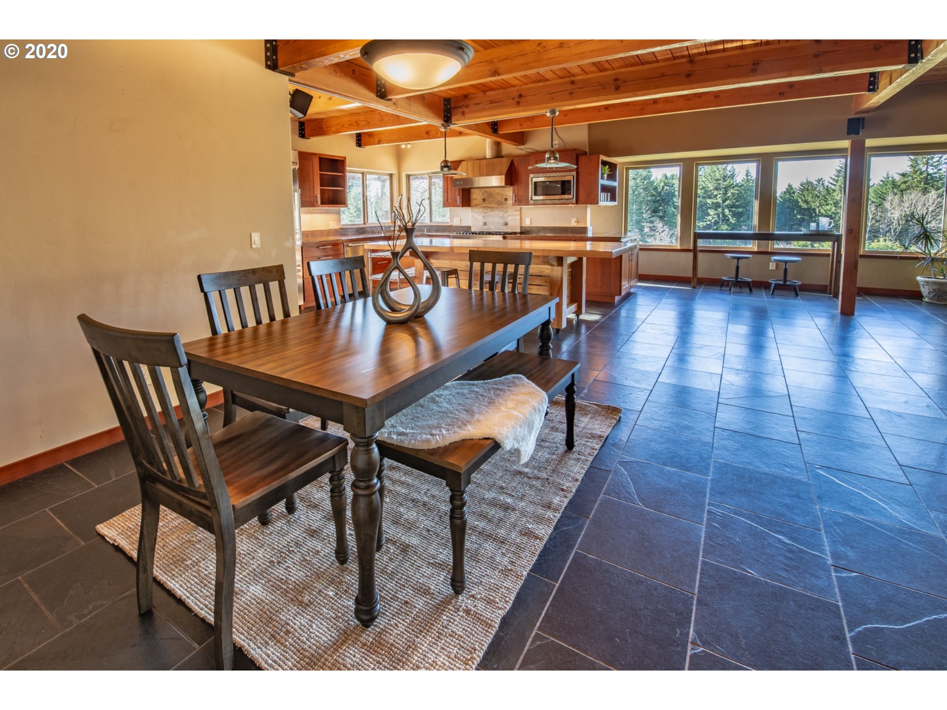 71 Tunnel Road White Salmon, WA 98672 - Photo 8 of 28 a view of a chairs and table in the balcony