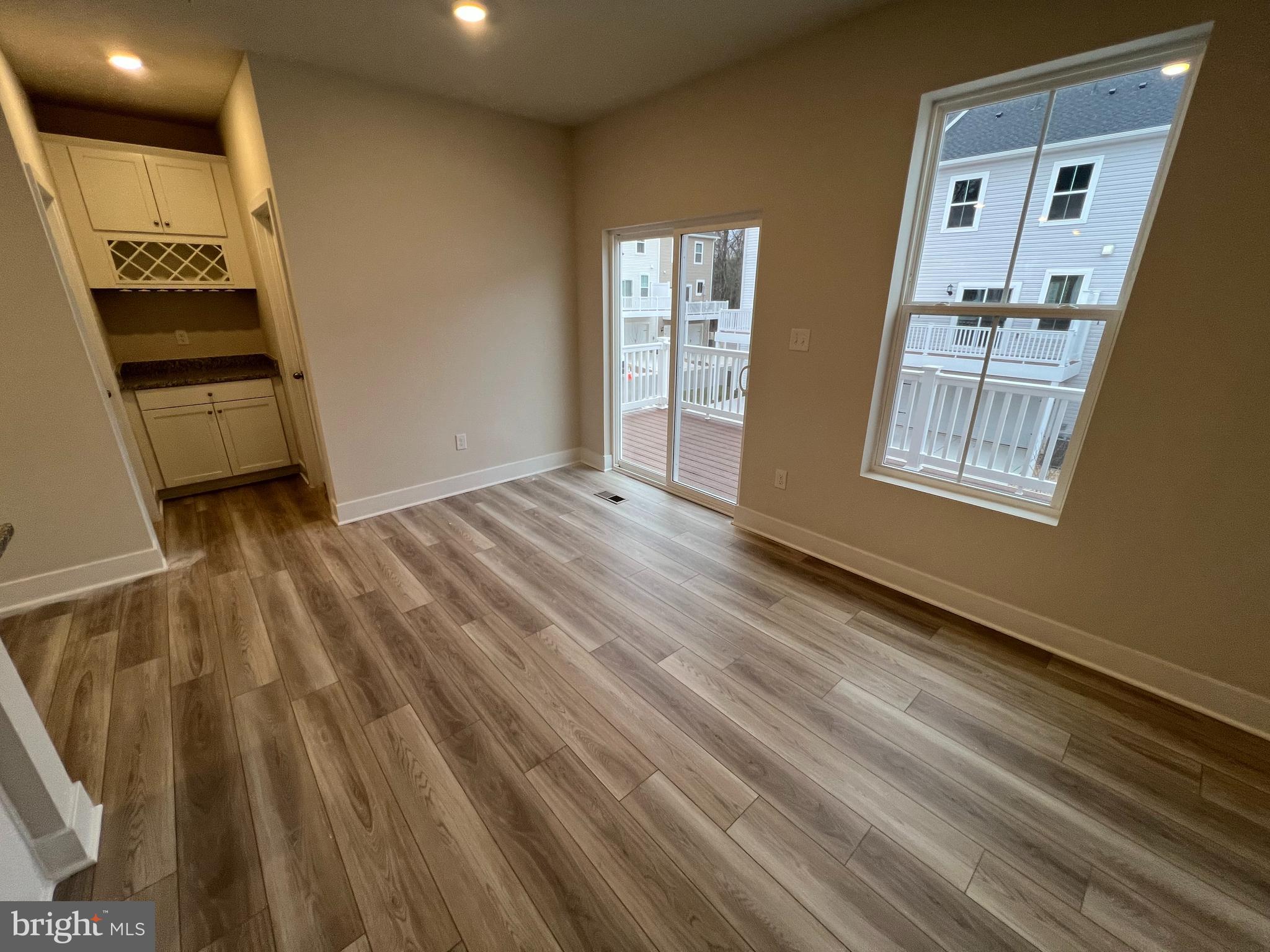7232 Contee Road Laurel, MD 20707 - Photo 5 of 8 a view of an empty room and a kitchen