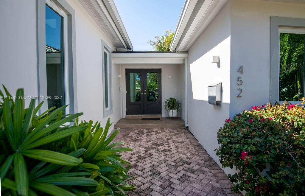 452 Woodcrest Road Key Biscayne, FL 33149 - Photo 22 of 23 a view of a garden with pathway
