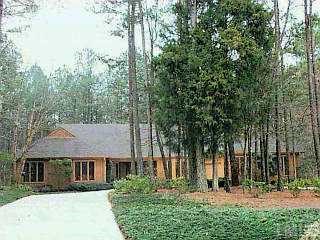 713 Presnell Court Raleigh, NC 27615 - Photo 1 of 1 front view of house with a garden