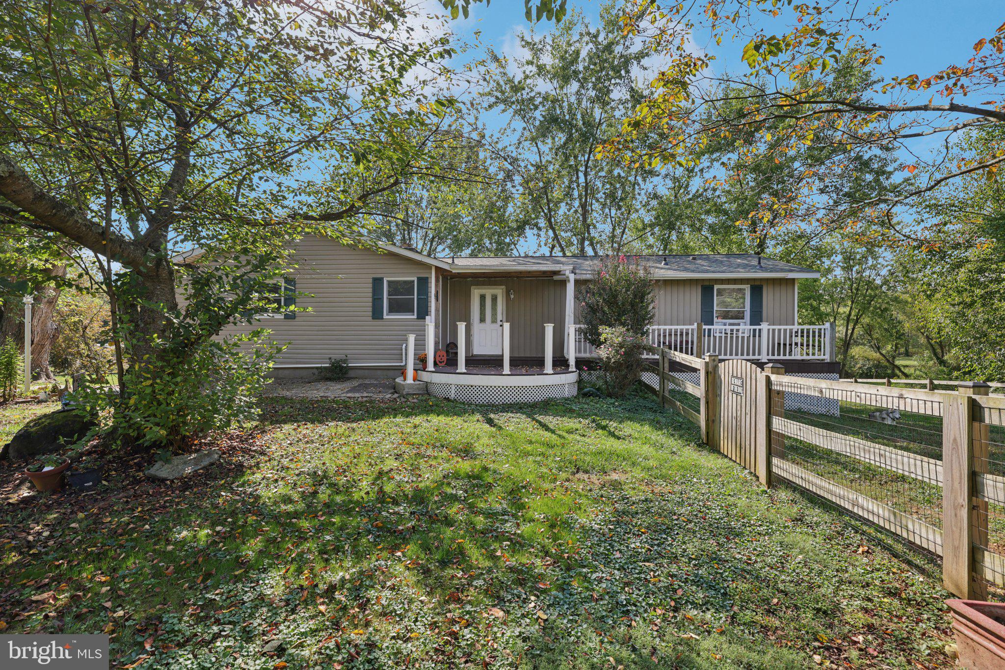 2636 Marston Road New Windsor, MD 21776 - Photo 2 of 107 a view of a house with backyard porch and furniture