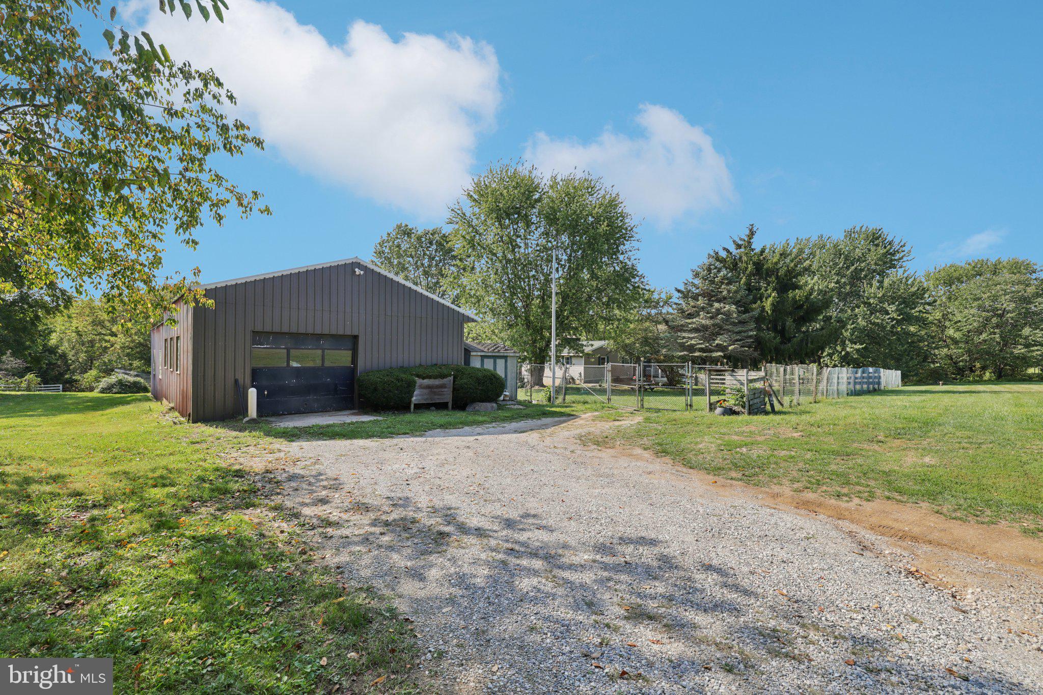 2636 Marston Road New Windsor, MD 21776 - Photo 32 of 107 a house view with a garden space