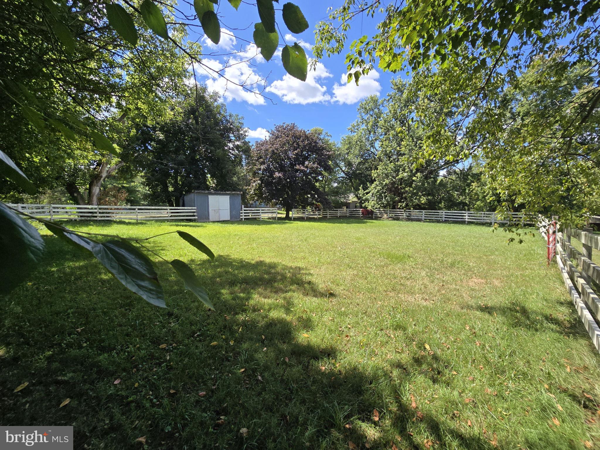 2636 Marston Road New Windsor, MD 21776 - Photo 36 of 107 a view of a big yard with swimming pool and trees