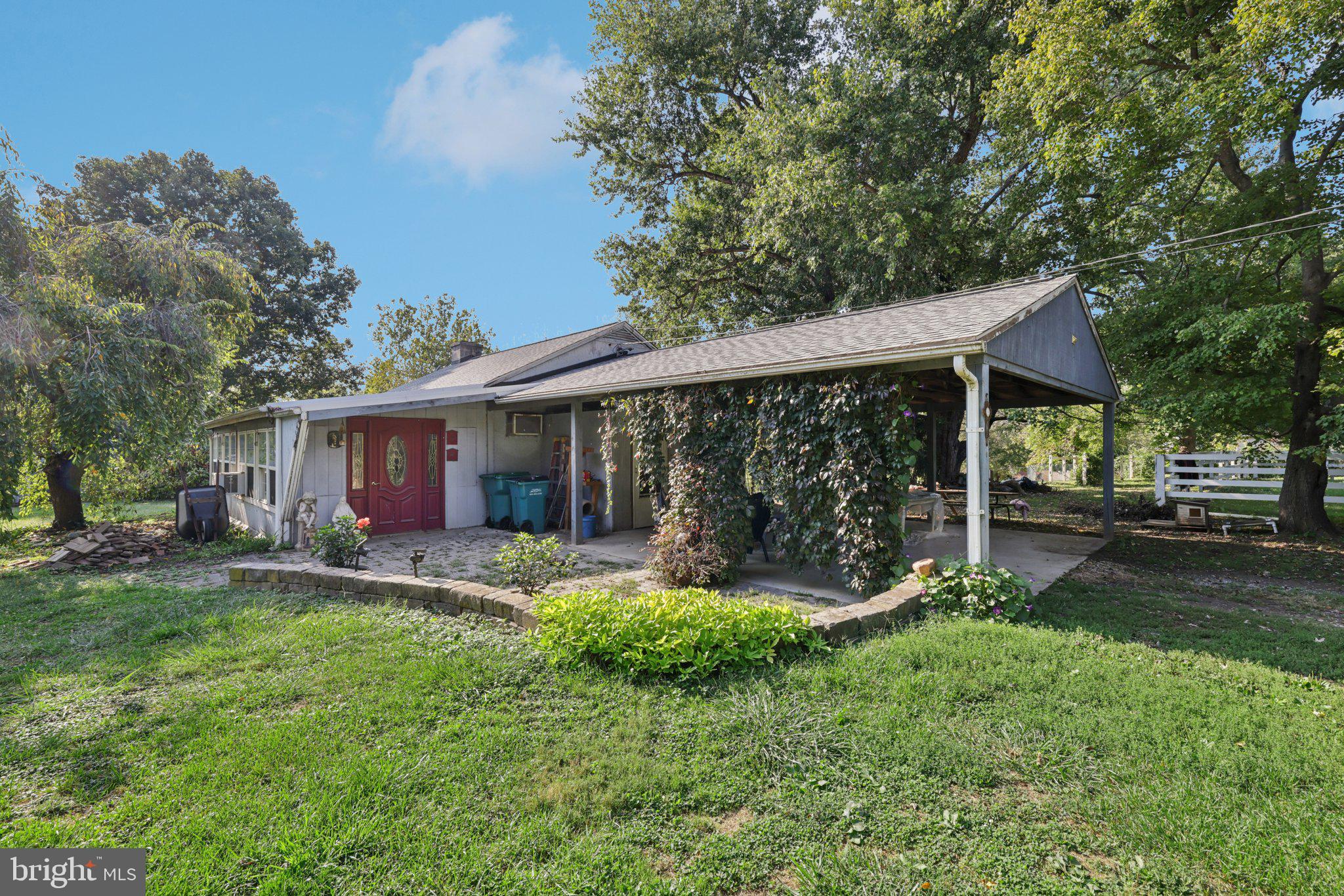 2636 Marston Road New Windsor, MD 21776 - Photo 43 of 107 a view of a house with a yard and sitting area