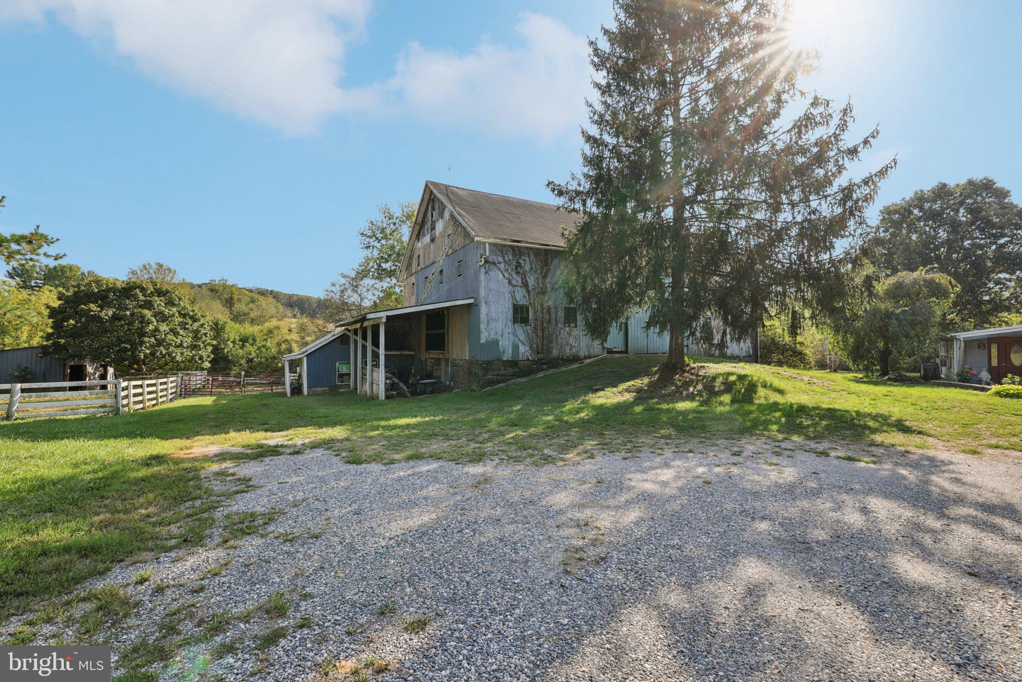 2636 Marston Road New Windsor, MD 21776 - Photo 52 of 107 a view of a house with a yard