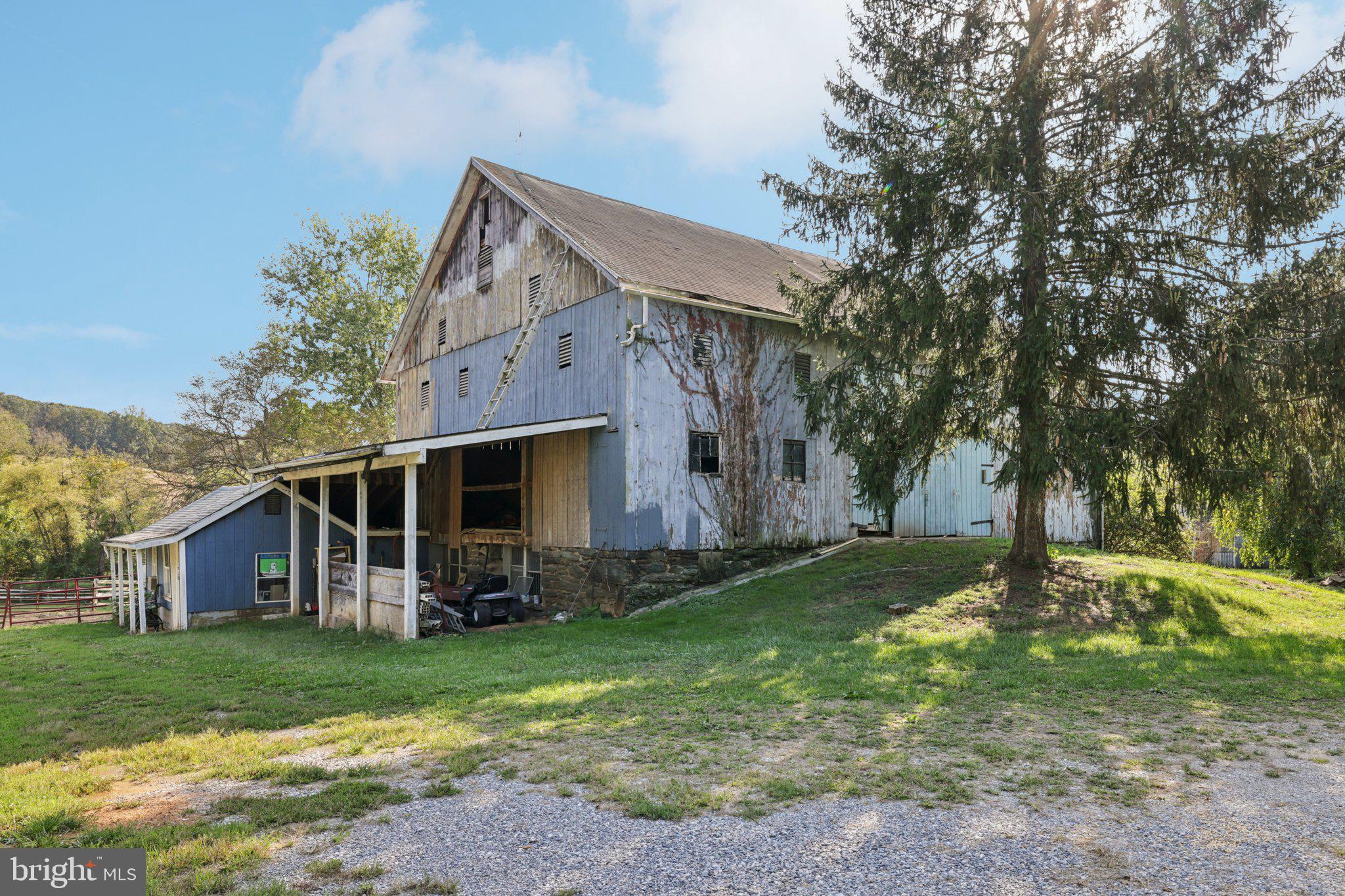 2636 Marston Road New Windsor, MD 21776 - Photo 53 of 107 a front view of house with a garden and patio