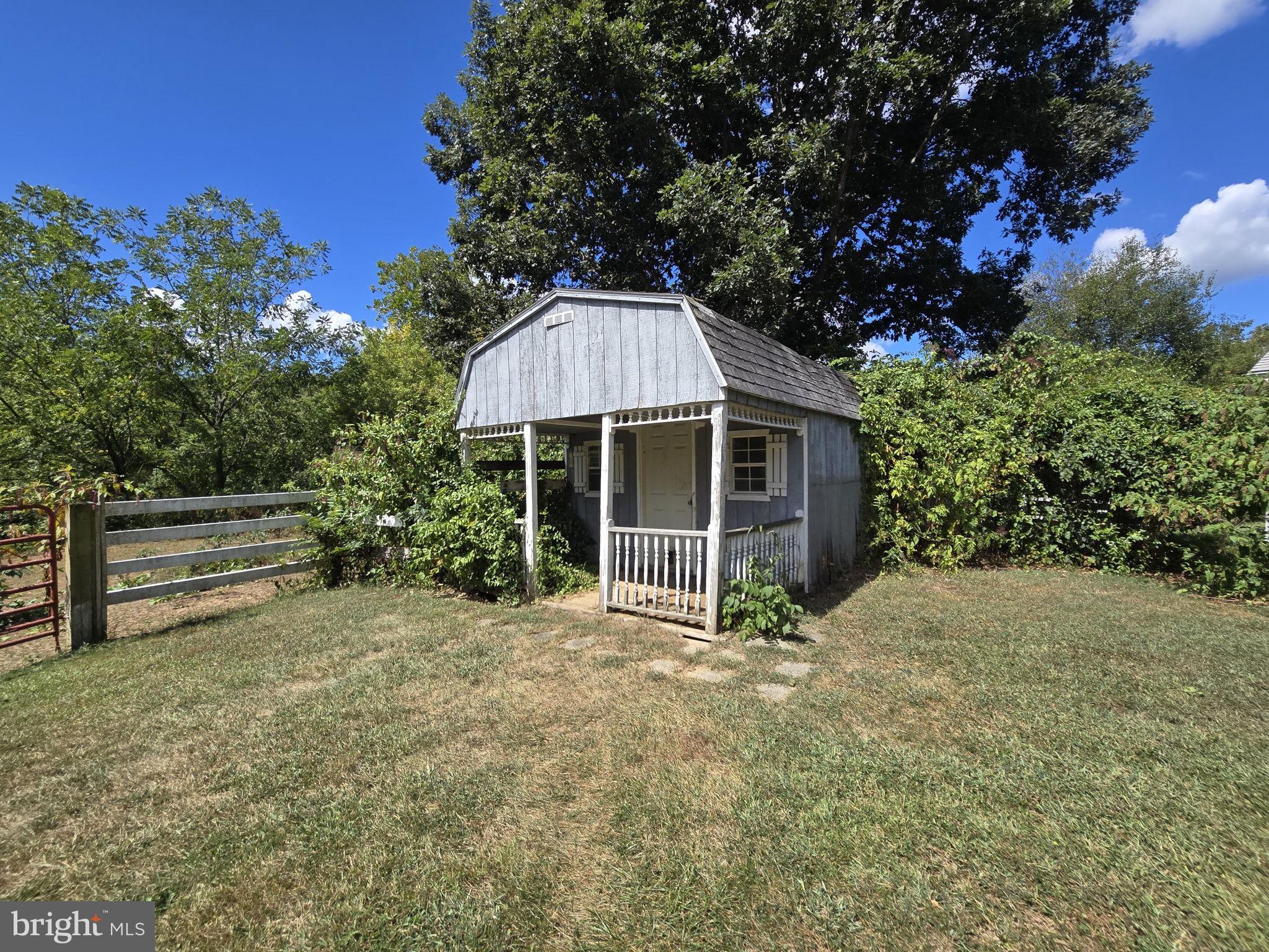 2636 Marston Road New Windsor, MD 21776 - Photo 59 of 107 a view of a house with a yard and potted plants