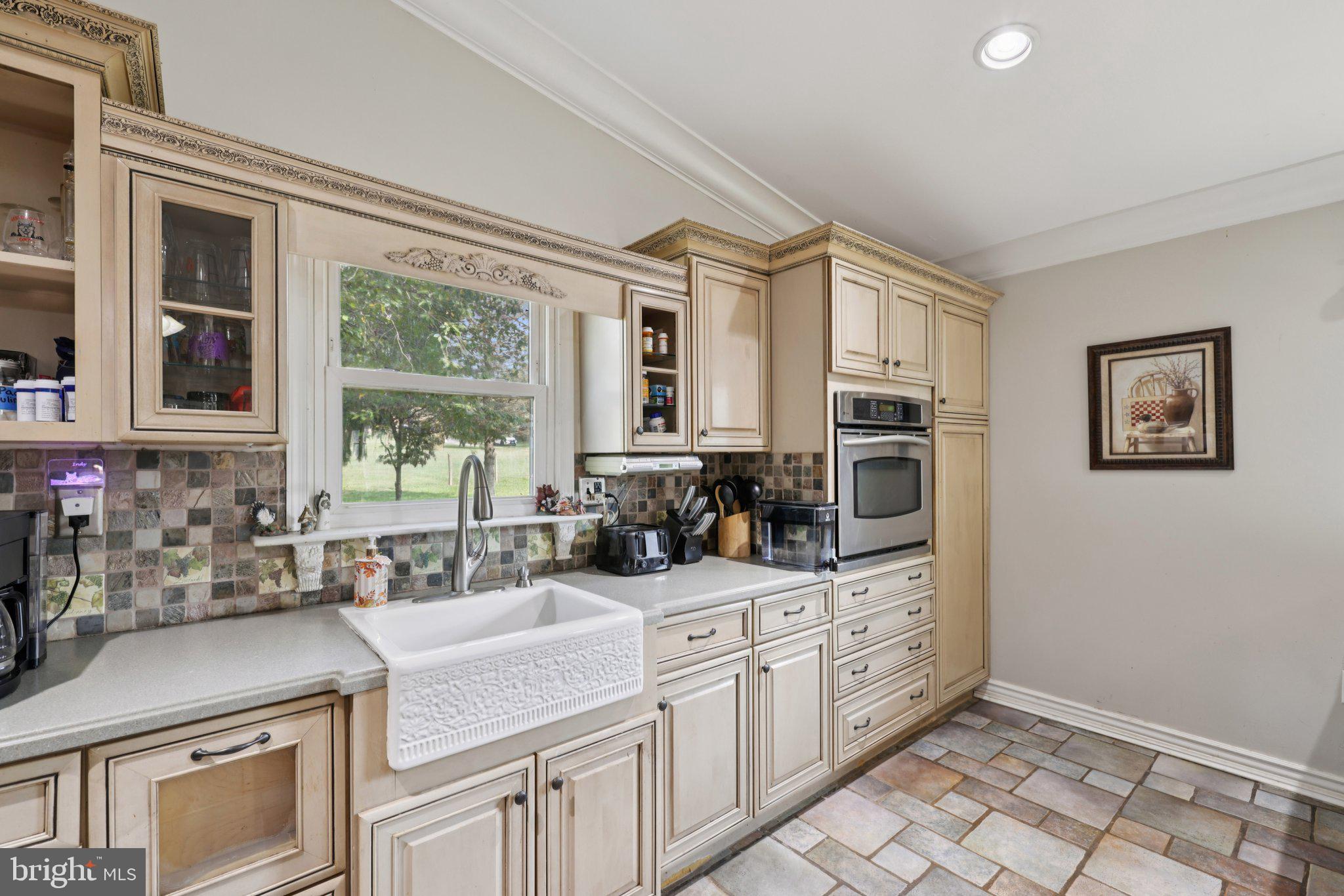 2636 Marston Road New Windsor, MD 21776 - Photo 6 of 107 a kitchen with sink cabinets and window