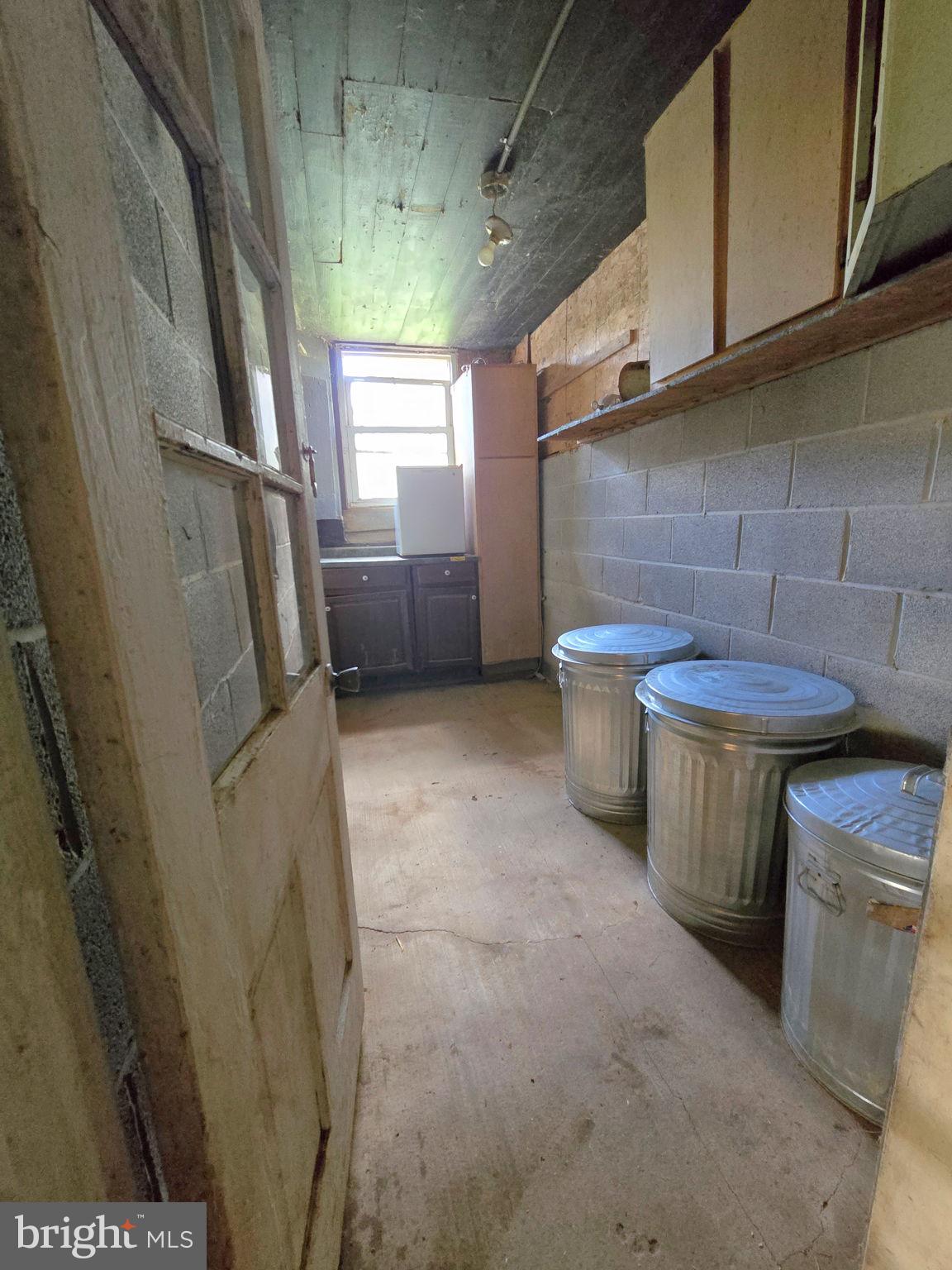 2636 Marston Road New Windsor, MD 21776 - Photo 73 of 107 a view of a storage & utility room with a sink