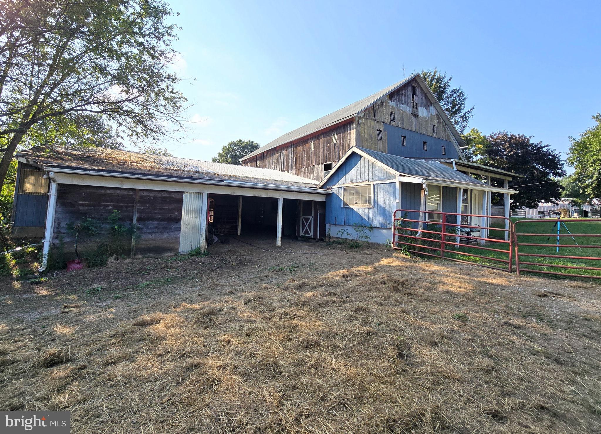 2636 Marston Road New Windsor, MD 21776 - Photo 92 of 107 a front view of a house with a yard and garage
