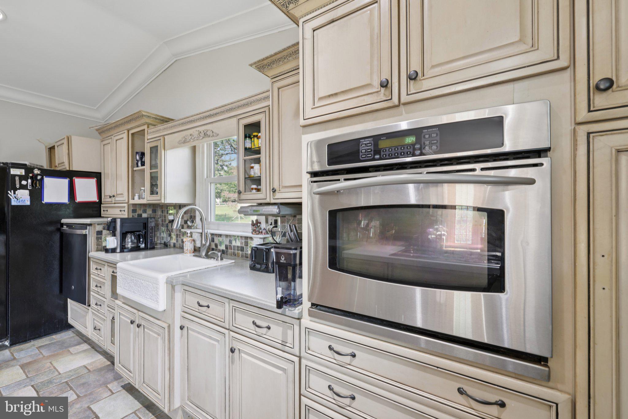 2636 Marston Road New Windsor, MD 21776 - Photo 9 of 107 a kitchen with white cabinets and appliances