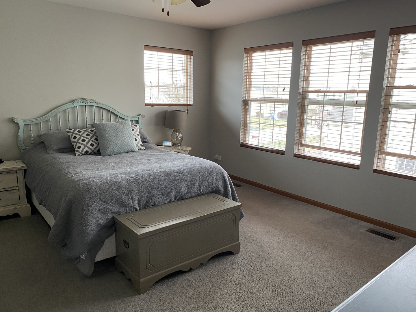 1841 Butterfield Road Woodstock, IL 60098 - Photo 18 of 26 a bedroom with a bed and window
