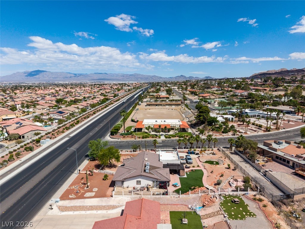 892 North Hollywood Boulevard Las Vegas, NV 89110 - Photo 74 of 81 This elevated view captures a sprawling residential area nestled against distant mountains.