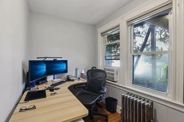a room with furniture and a window