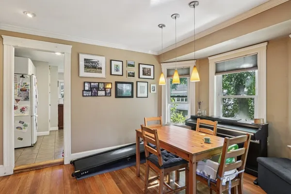 a room with furniture and wooden floor