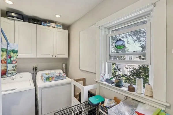a kitchen with appliances cabinets and a sink