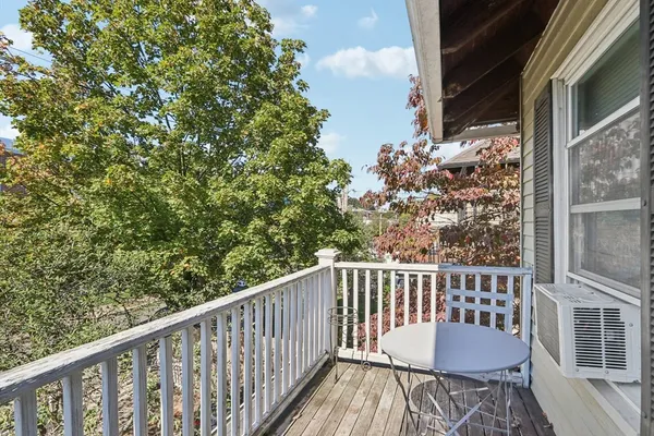 a view of a balcony with plants