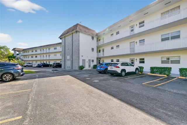 a car parked in front of a building