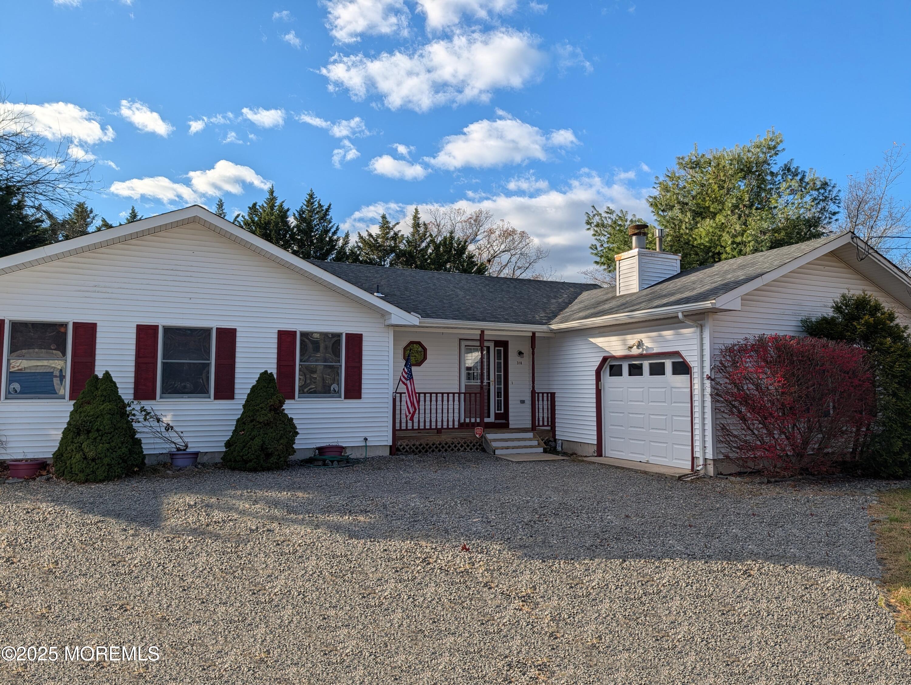 318 Eleanor Road Forked River, NJ 08731 - Photo 2 of 13 a front view of a house with a yard