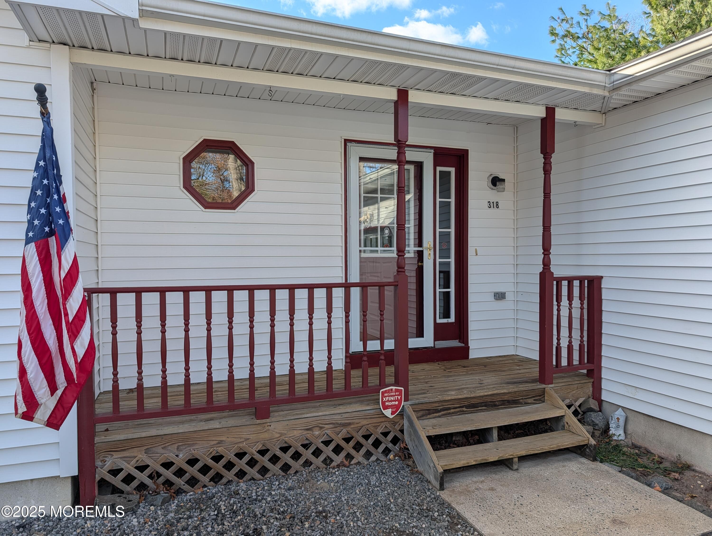318 Eleanor Road Forked River, NJ 08731 - Photo 3 of 13 a front view of a house with entryway