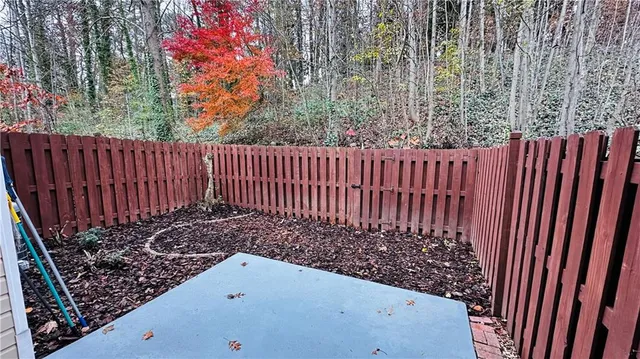a view of a wooden fence