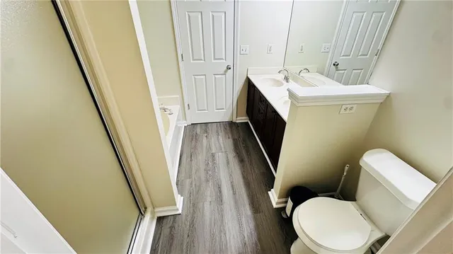 a bathroom with sink and a toilet