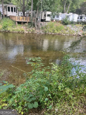 a view of residential houses with outdoor space