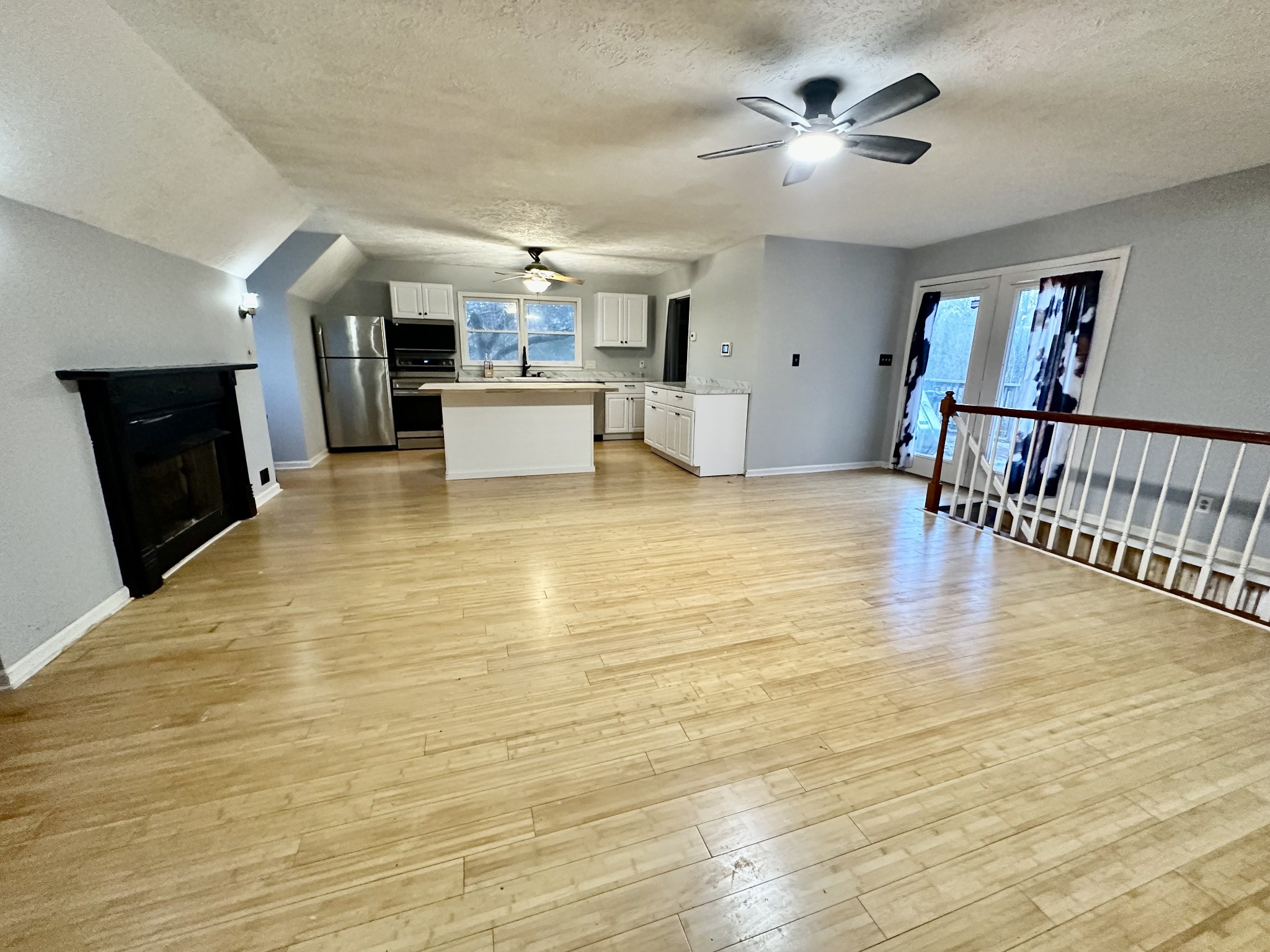 4036 Vernon Creek Road Cunningham, TN 37052 - Photo 1 of 26 a view of kitchen and dining room with wooden floor