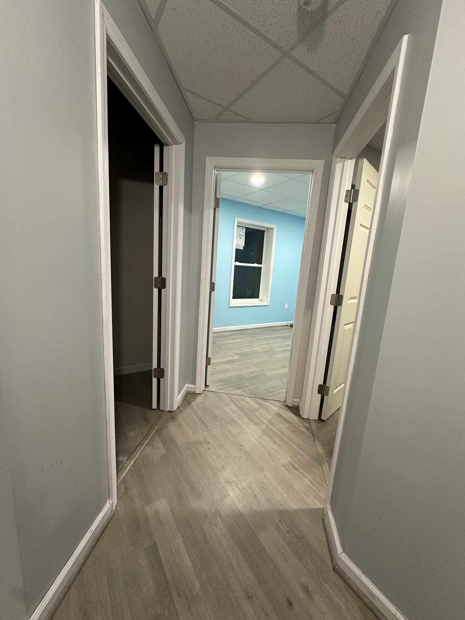 4036 Vernon Creek Road Cunningham, TN 37052 - Photo 16 of 26 an entryway of a livingroom with wooden floor and a window