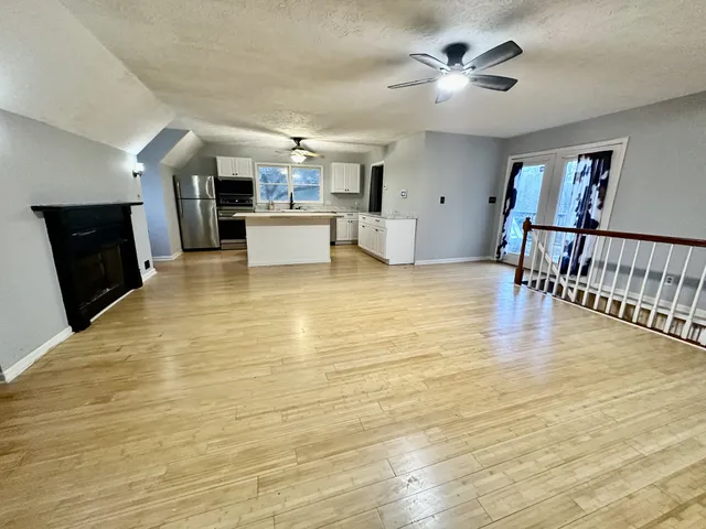 a living room with a fireplace