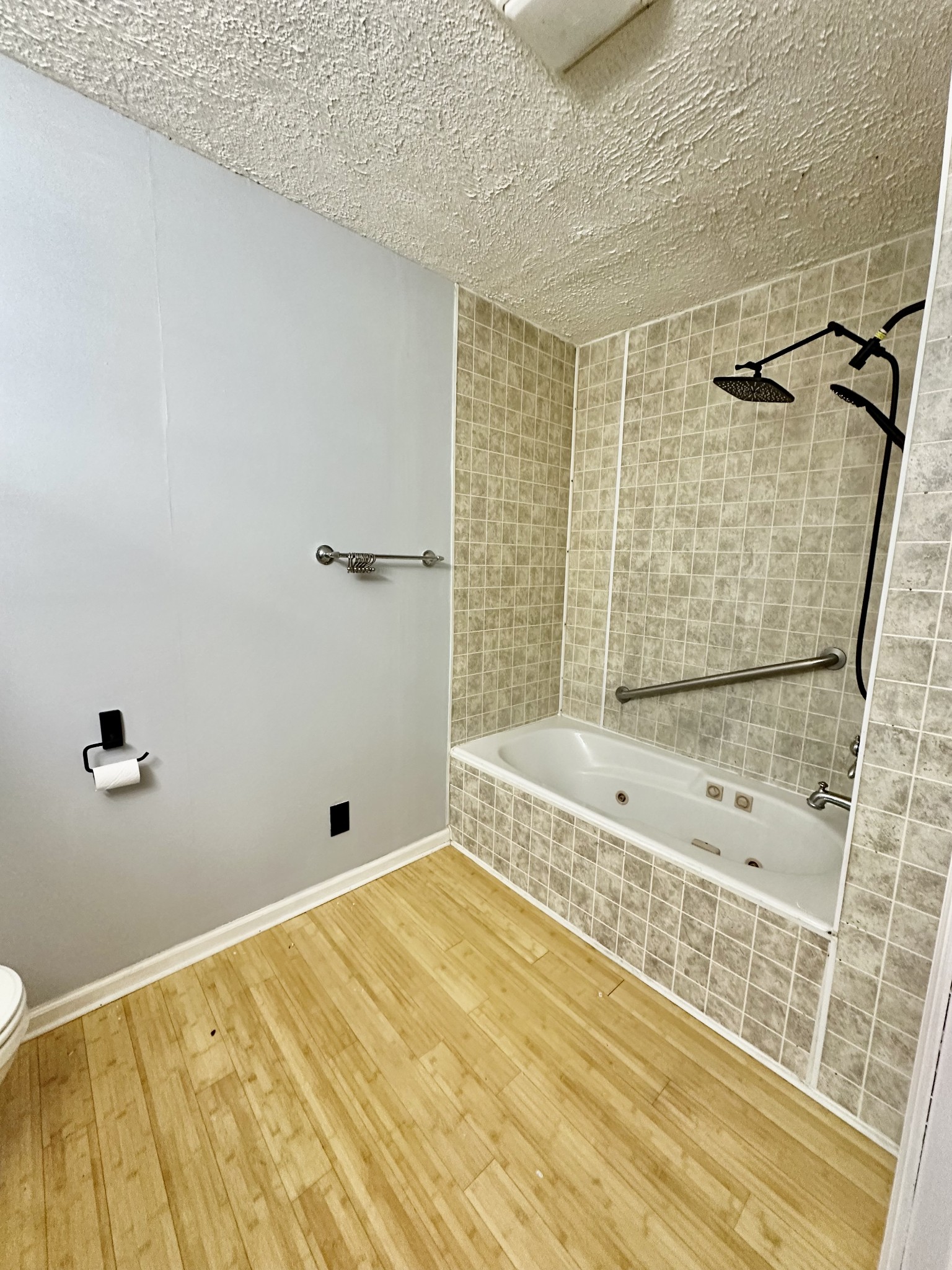 4036 Vernon Creek Road Cunningham, TN 37052 - Photo 8 of 26 a bathroom with a bathtub and shower