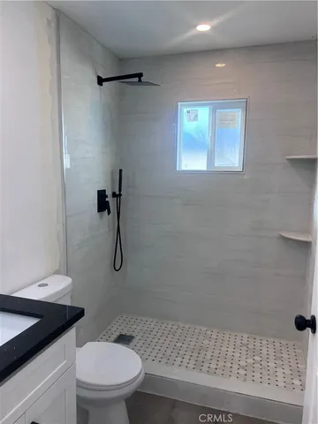 a kitchen with a sink and washing machine