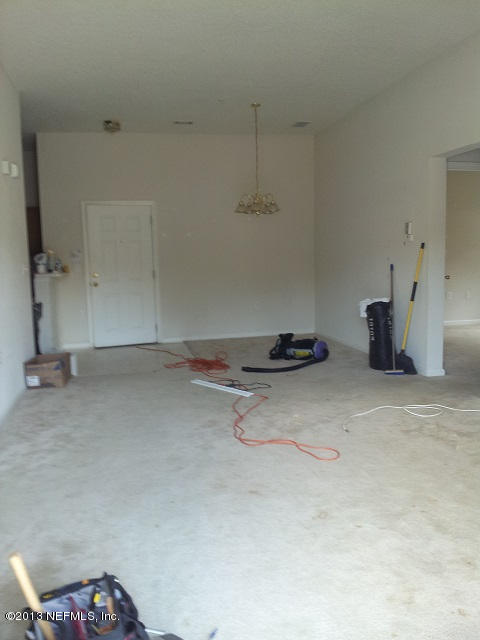 7920 Merrill Road, Unit 1701 Jacksonville, FL 32277 - Photo 8 of 8 a view of a room with gym equipment