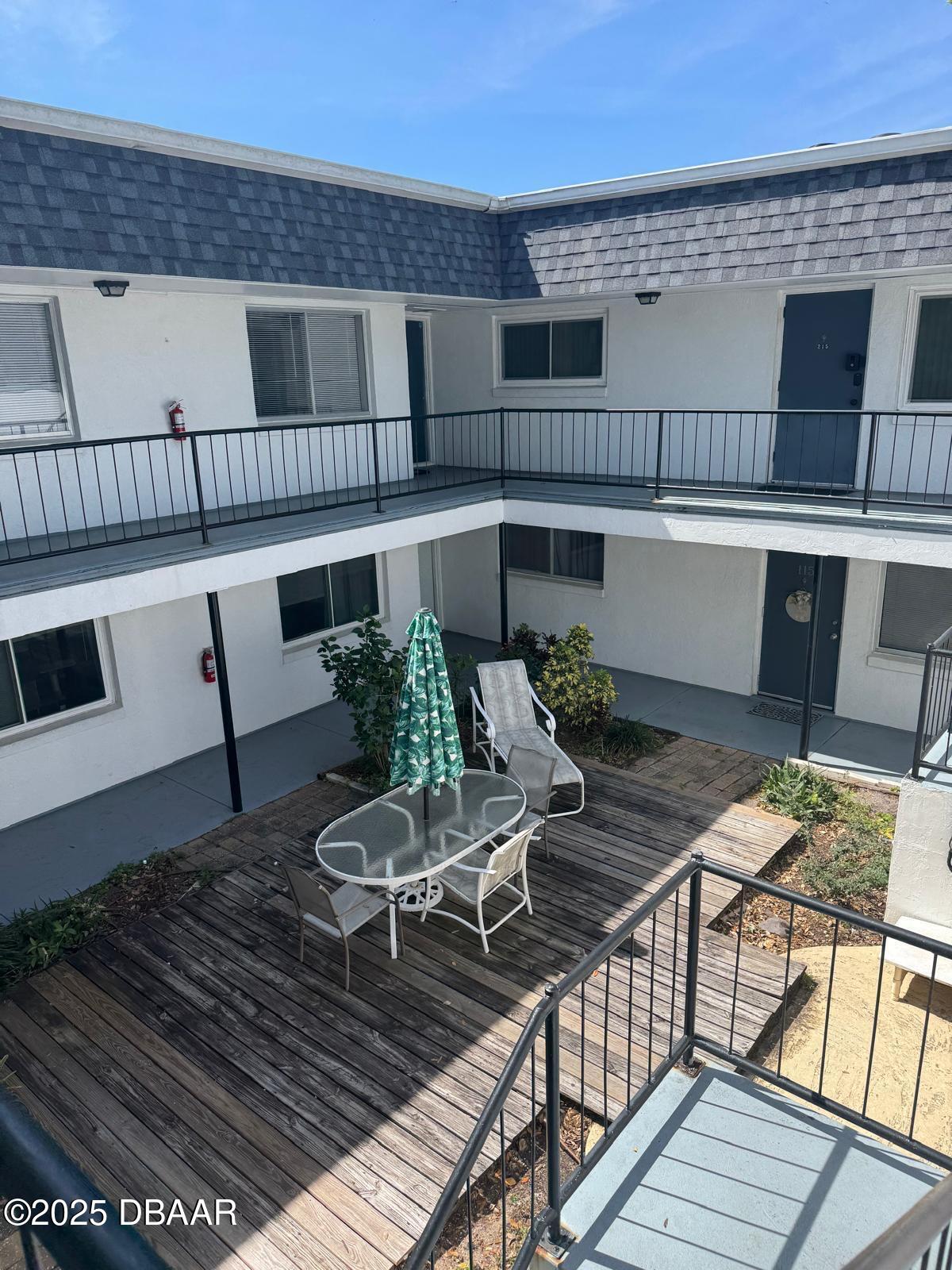 305 Ridge Boulevard, Unit 2110 South Daytona, FL 32119 - Photo 10 of 10 a view of a patio on the roof deck