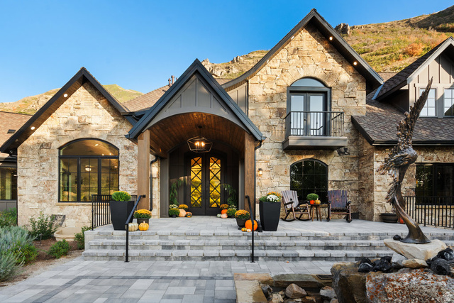1141 South Oak Leaf Lane Springville, UT 84663 - Photo 15 of 147 Stone and shingle exterior featuring an arched entryway with wood-finish ceiling, double entry doors, and an overhead lantern-style fixture