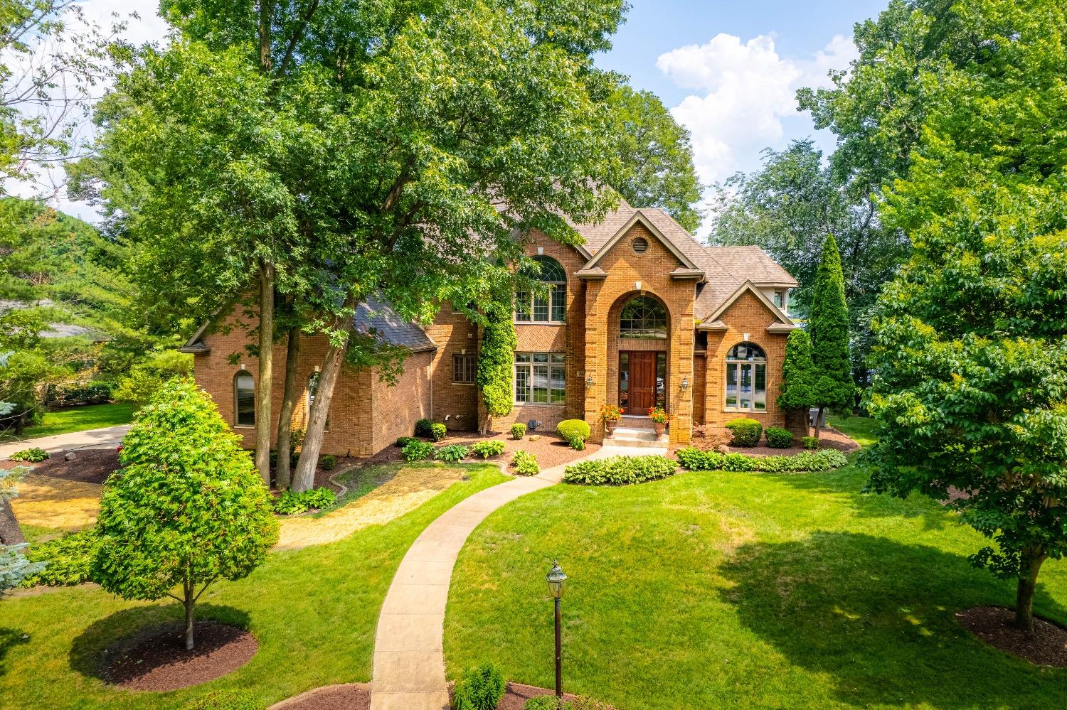 388 Deer Ridge Road Valparaiso, IN 46385 - Photo 1 of 35 a front view of a house with yard and green space