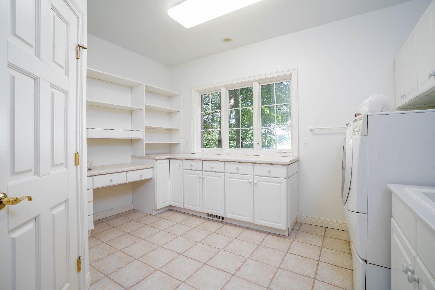 388 Deer Ridge Road Valparaiso, IN 46385 - Photo 14 of 35 a room with a stove and a refrigerator