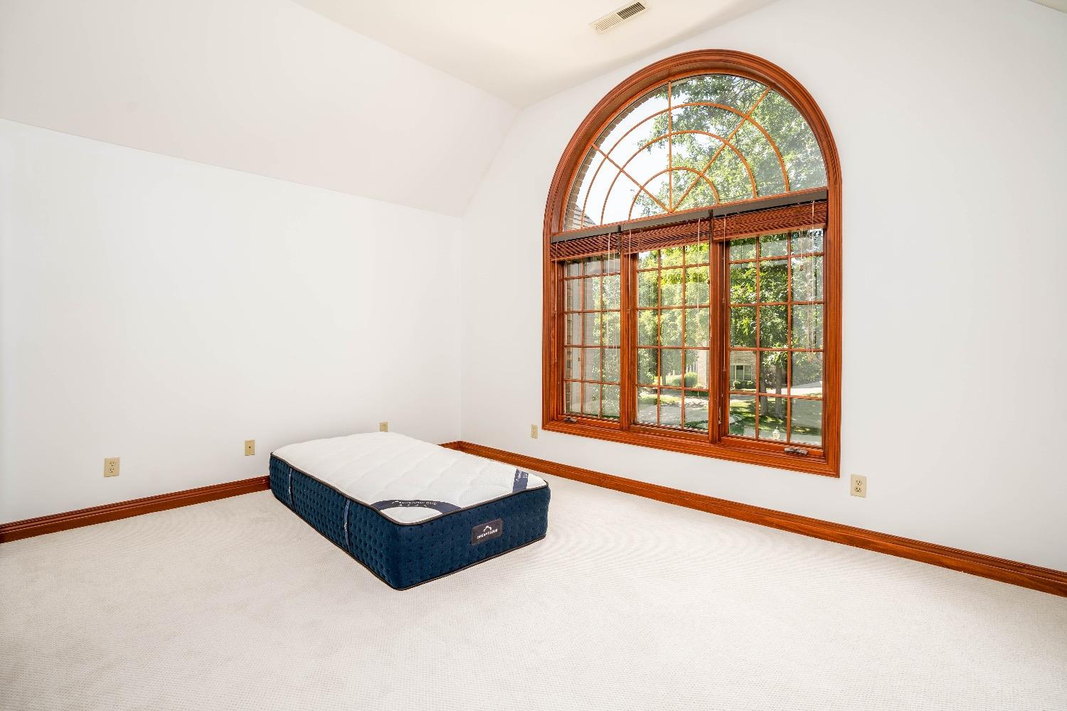 388 Deer Ridge Road Valparaiso, IN 46385 - Photo 16 of 35 an empty room with large window
