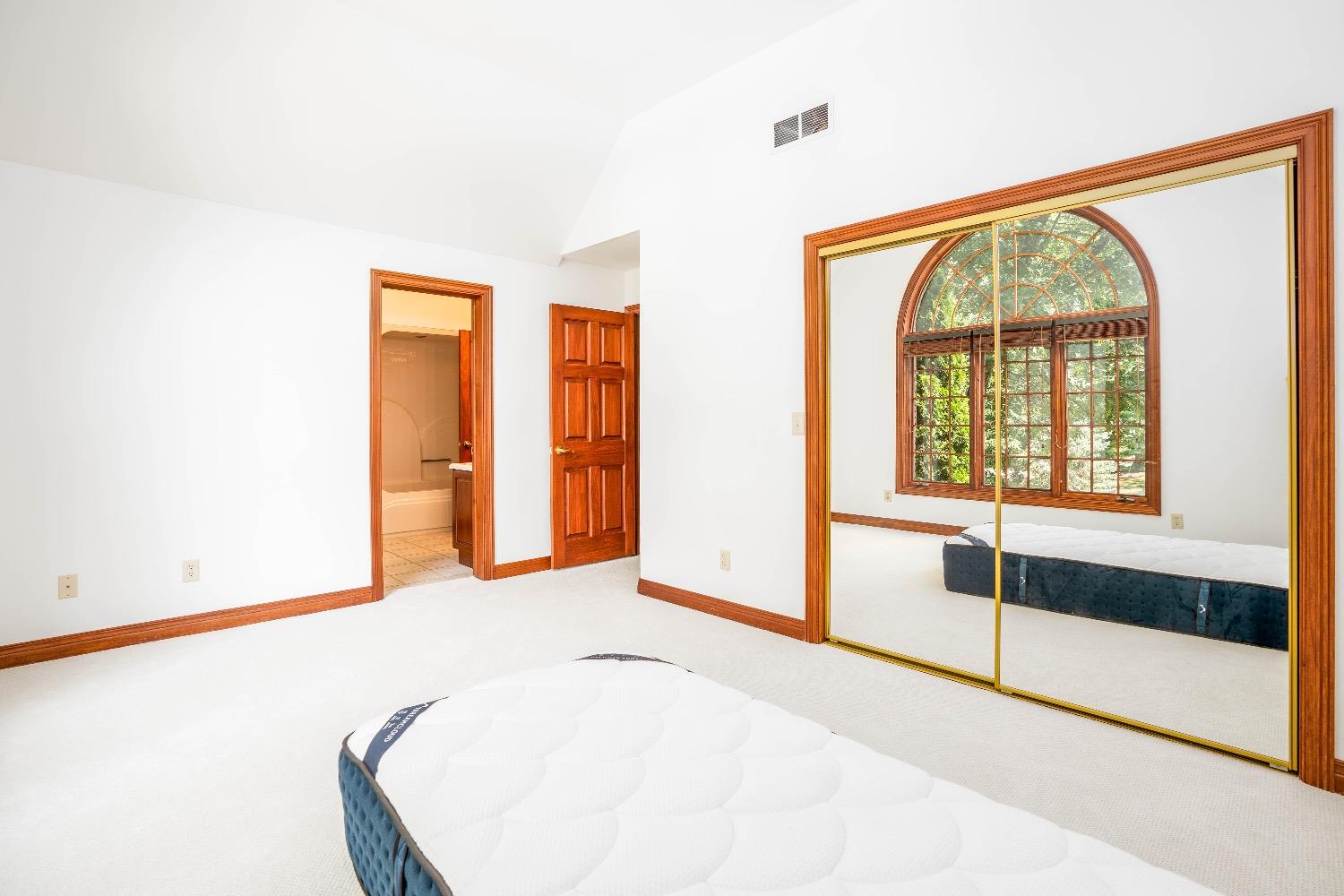 388 Deer Ridge Road Valparaiso, IN 46385 - Photo 17 of 35 a view of an empty room with glass door