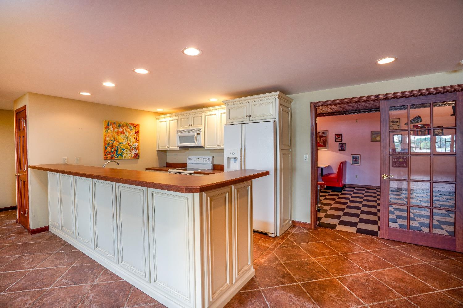 388 Deer Ridge Road Valparaiso, IN 46385 - Photo 27 of 35 a view of a hallway with wooden floor and windows