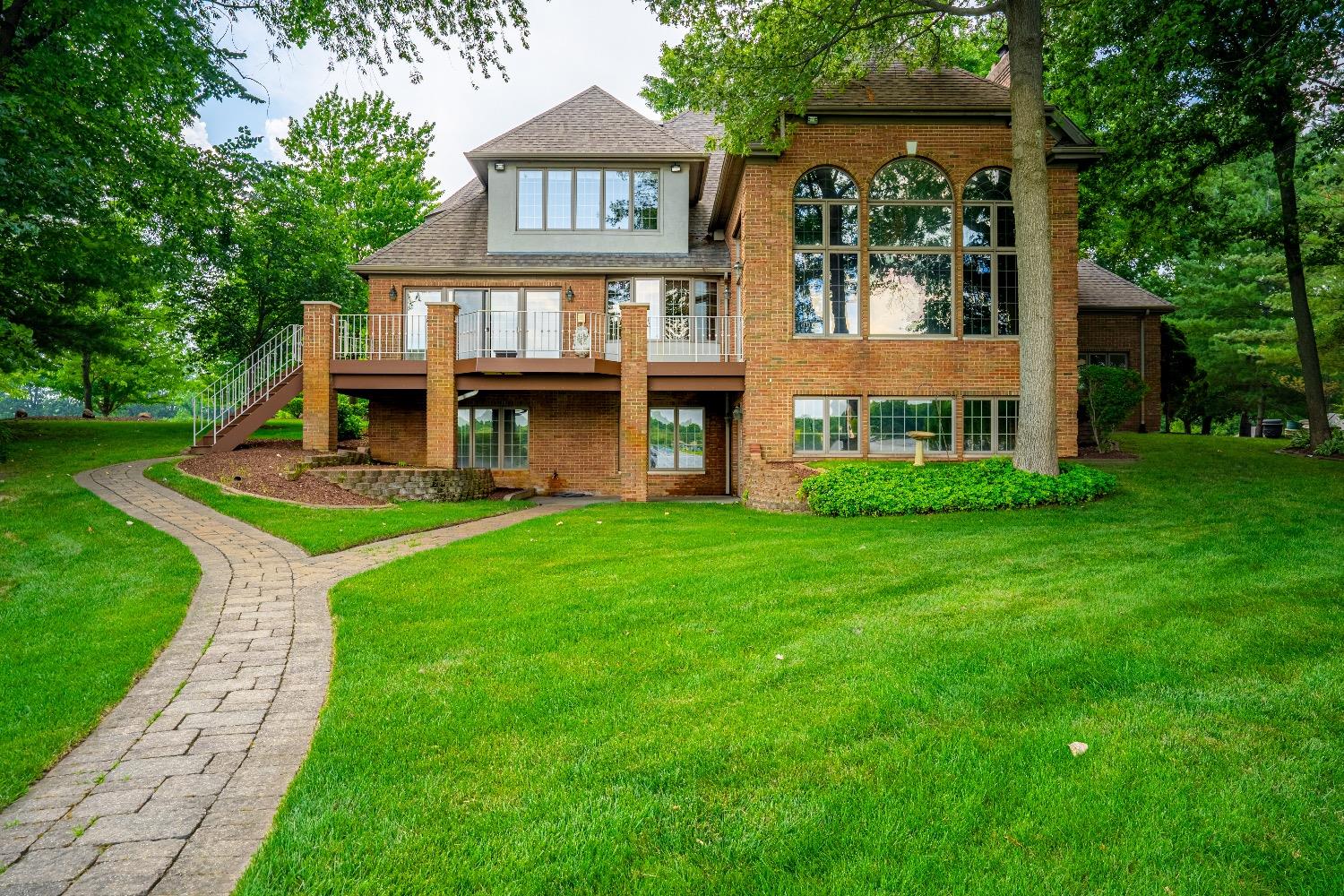 388 Deer Ridge Road Valparaiso, IN 46385 - Photo 32 of 35 a front view of a house with garden