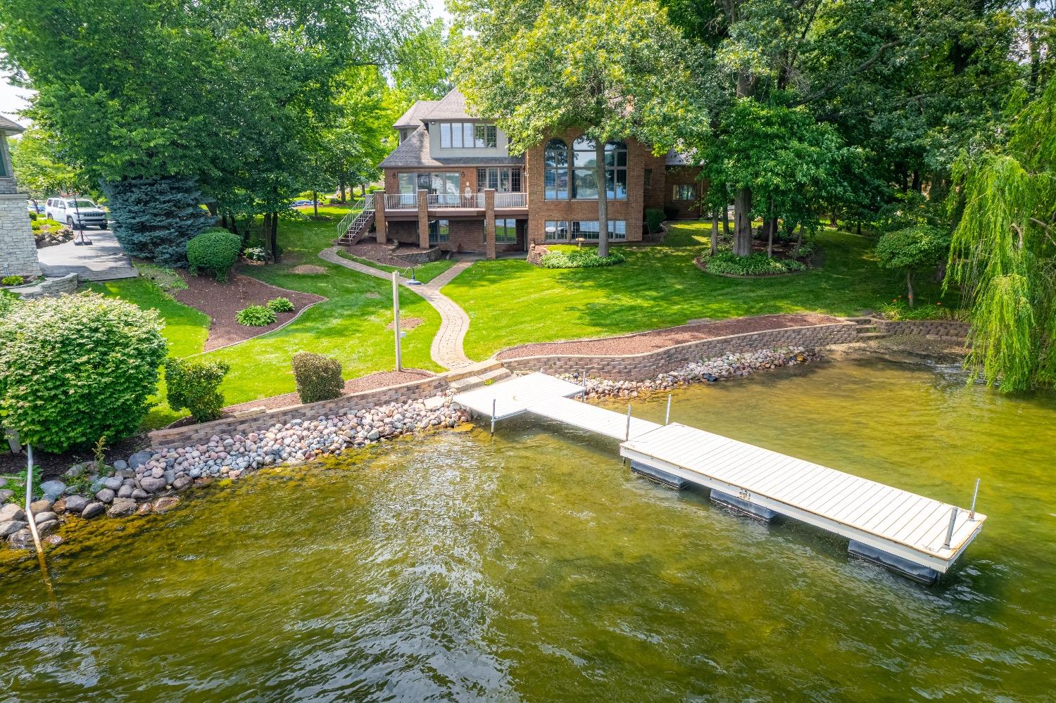 388 Deer Ridge Road Valparaiso, IN 46385 - Photo 35 of 35 a view of a swimming pool with a patio and a yard