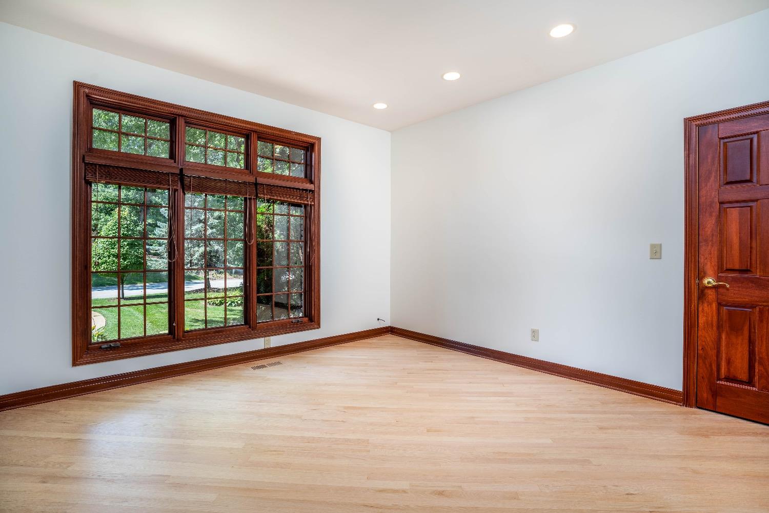 388 Deer Ridge Road Valparaiso, IN 46385 - Photo 6 of 35 a view of an empty room with a window