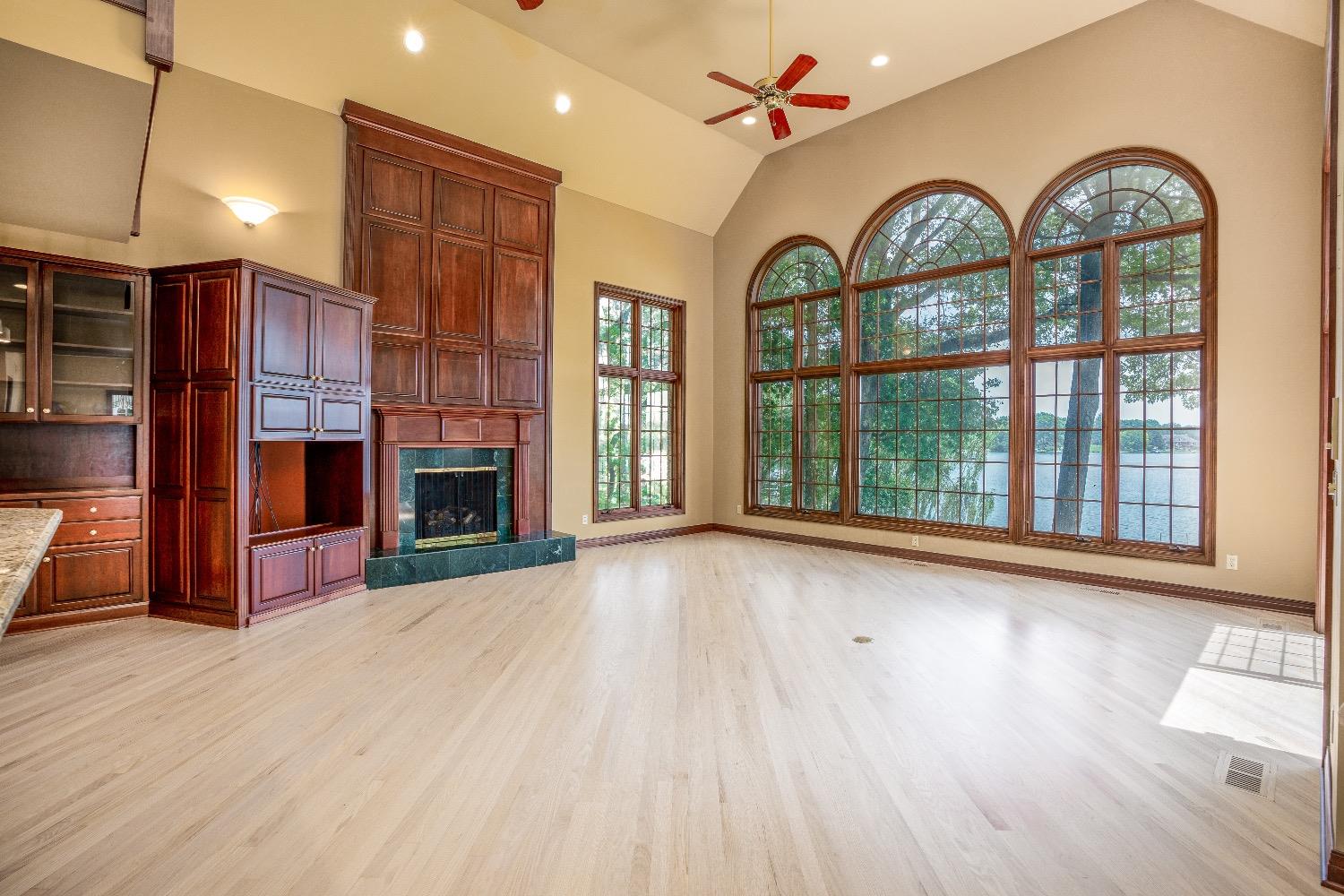 388 Deer Ridge Road Valparaiso, IN 46385 - Photo 8 of 35 a view of livingroom with furniture wooden floor fan and window