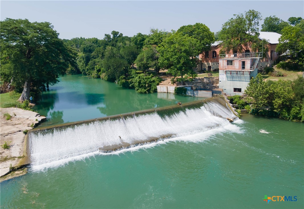925 River Ranch Circle Martindale, TX 78655 - Photo 48 of 48 an aerial view of residential houses with outdoor space and lake view