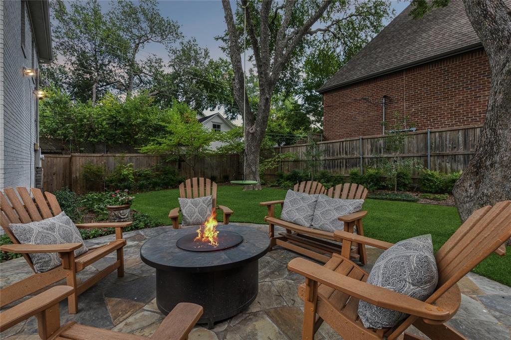 7515 Marquette Street Dallas, TX 75225 - Photo 19 of 25 a view of a table and chairs in the patio