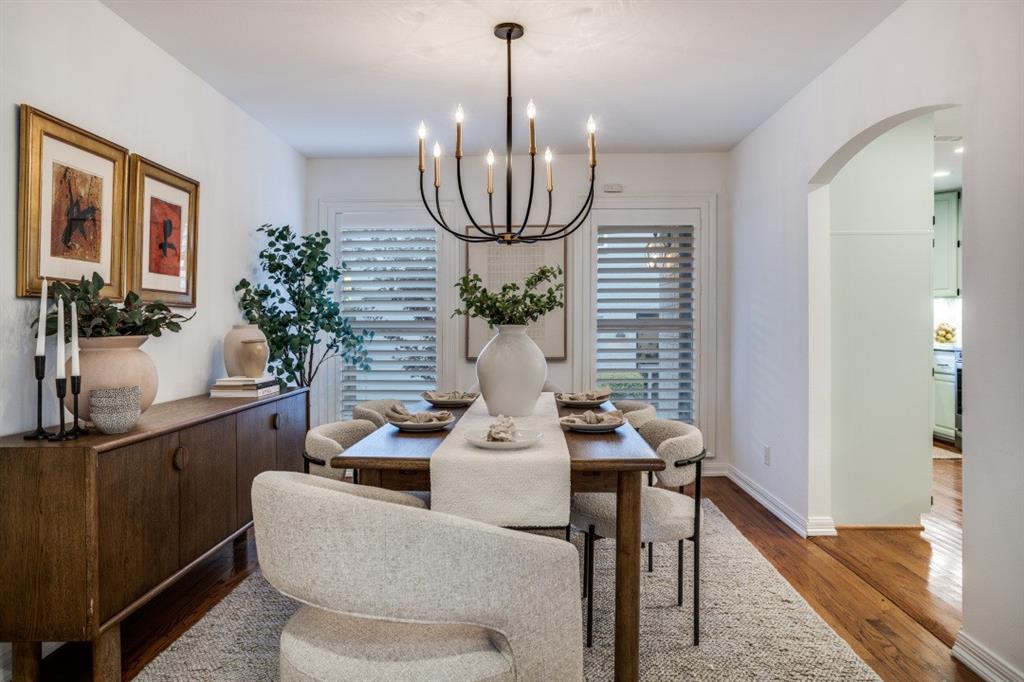 7515 Marquette Street Dallas, TX 75225 - Photo 9 of 25 a view of a dining room with furniture window and flowerpot