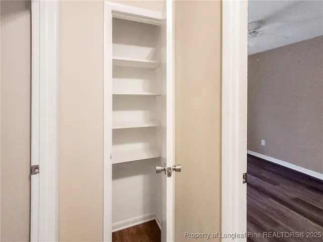 a view of a hallway with closet