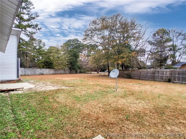 a view of swimming pool with an outdoor space and seating area